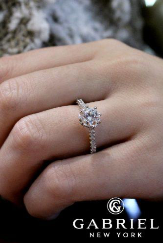 Elegant engagement ring with a tiara design on Craiyon
